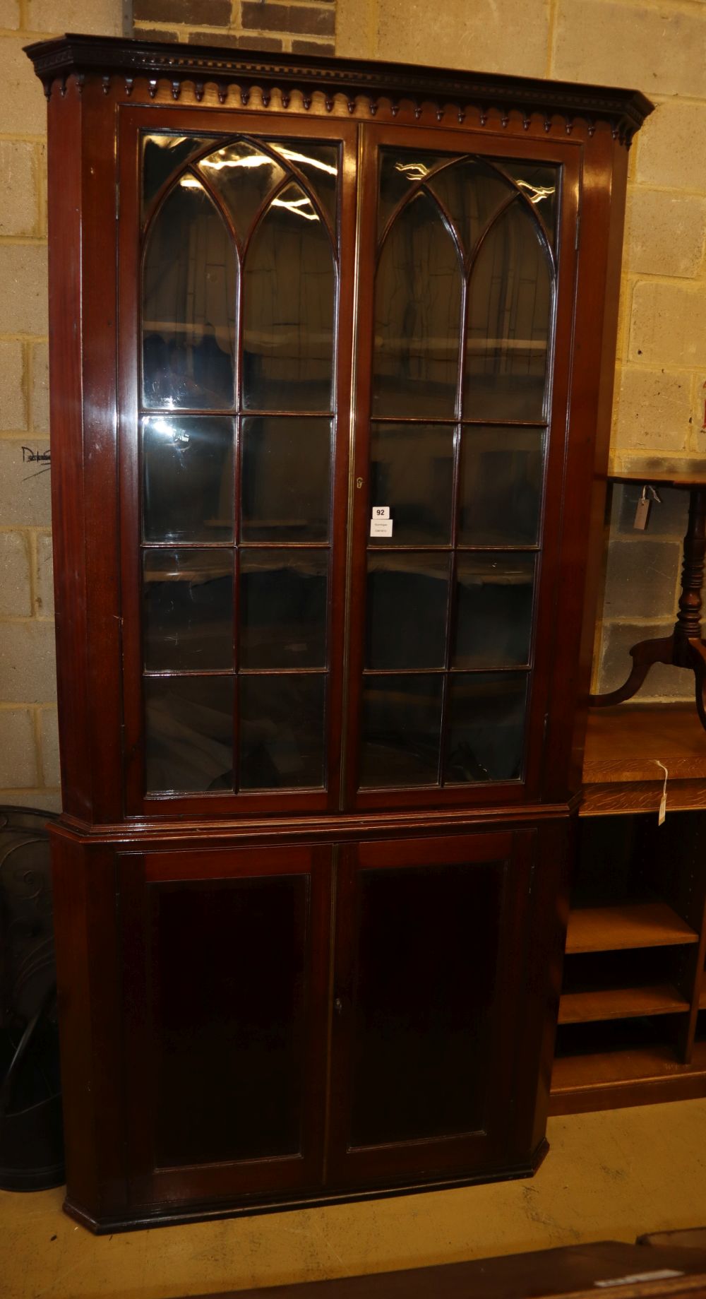 A George III mahogany standing corner cabinet, W.110cm, D.55cm, H.225cm